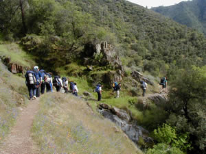 the team hikes into Hite's Cove