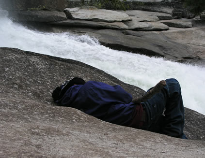 randy sleeping by river